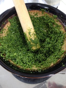 grinding yuzu peel and chili pepper 